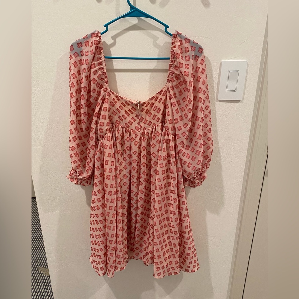 Impeccable pig pink puff long sleeve print dress